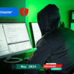 A hacker working on a computer with Ticketmaster and breach icons in the background, highlighting the May 2024 Ticketmaster data breach incident